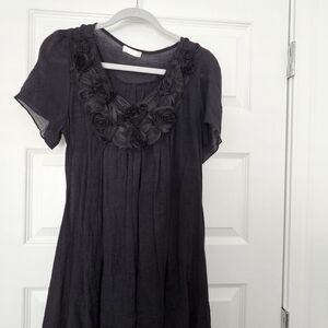 Elegant Black Dress with Floral Accents